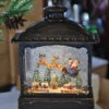 11 Inch Decorative Bronze Water Lantern With Flying Santa In Swirling Glitter