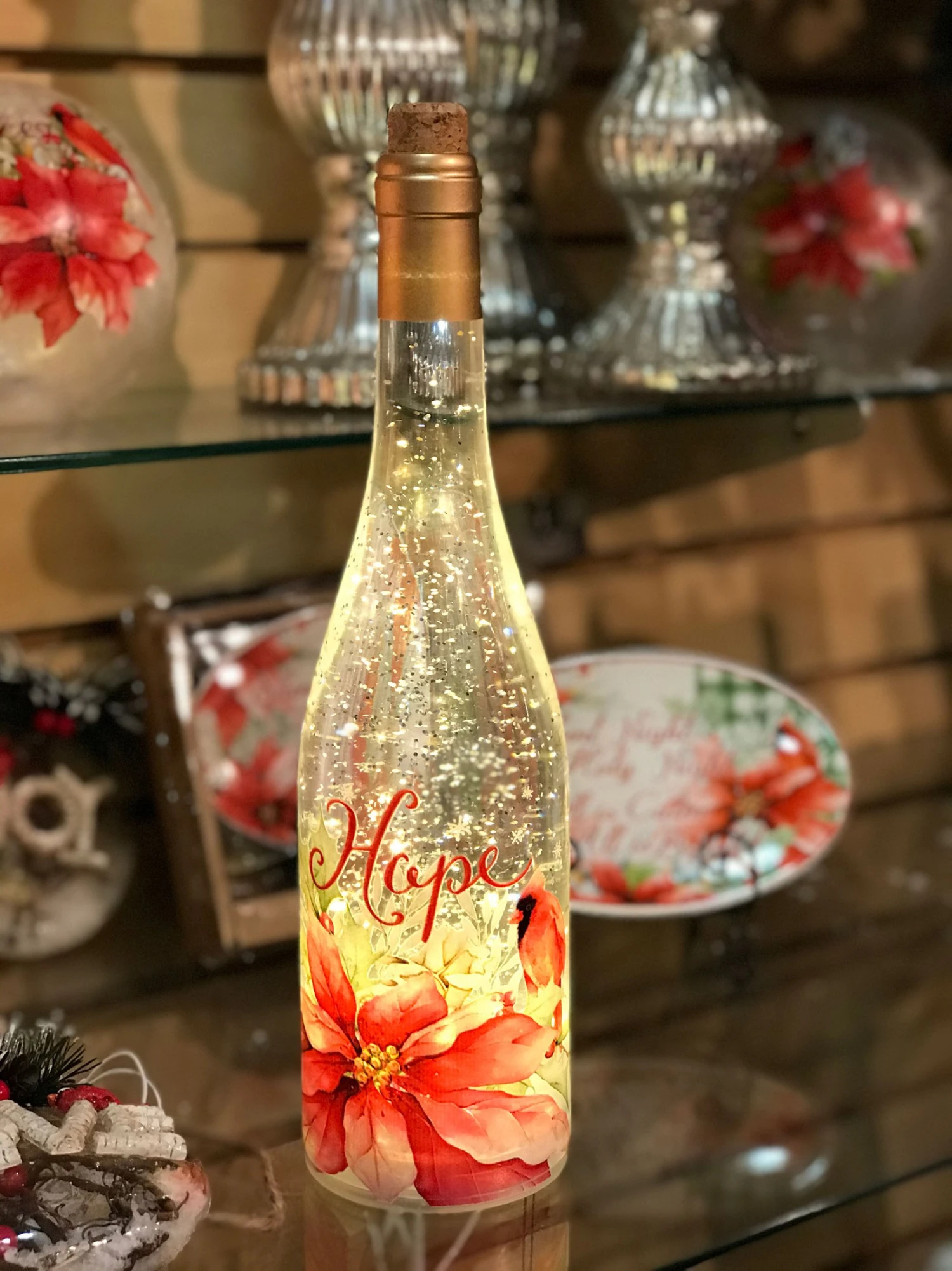 Lighted Wine Bottle With Swirling Glitter Hope Poinsettia Design With Cardinals Snow Globe 1 Lighted Wine Bottle With Swirling Glitter Hope Poinsettia Design With Cardinals Snow Globe